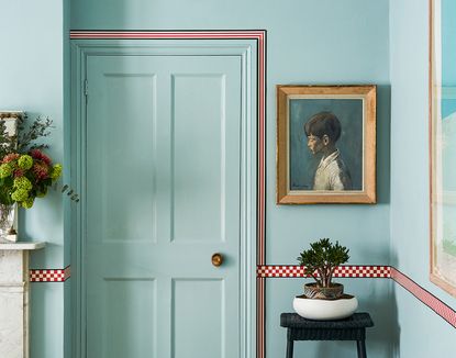 blue living room walls with red trim