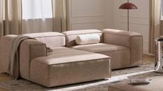 a beige low slung sofa