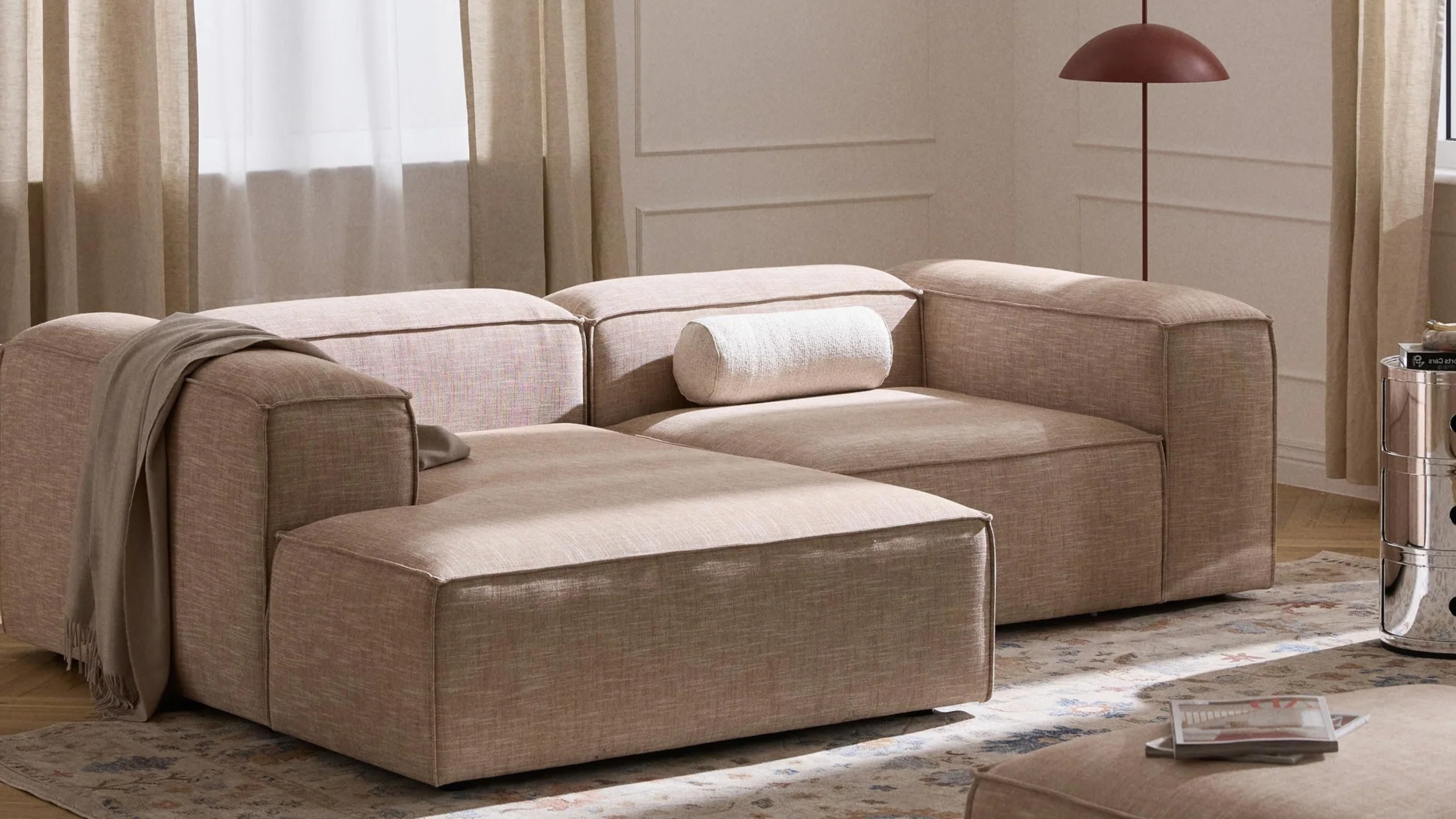 a beige low slung sofa