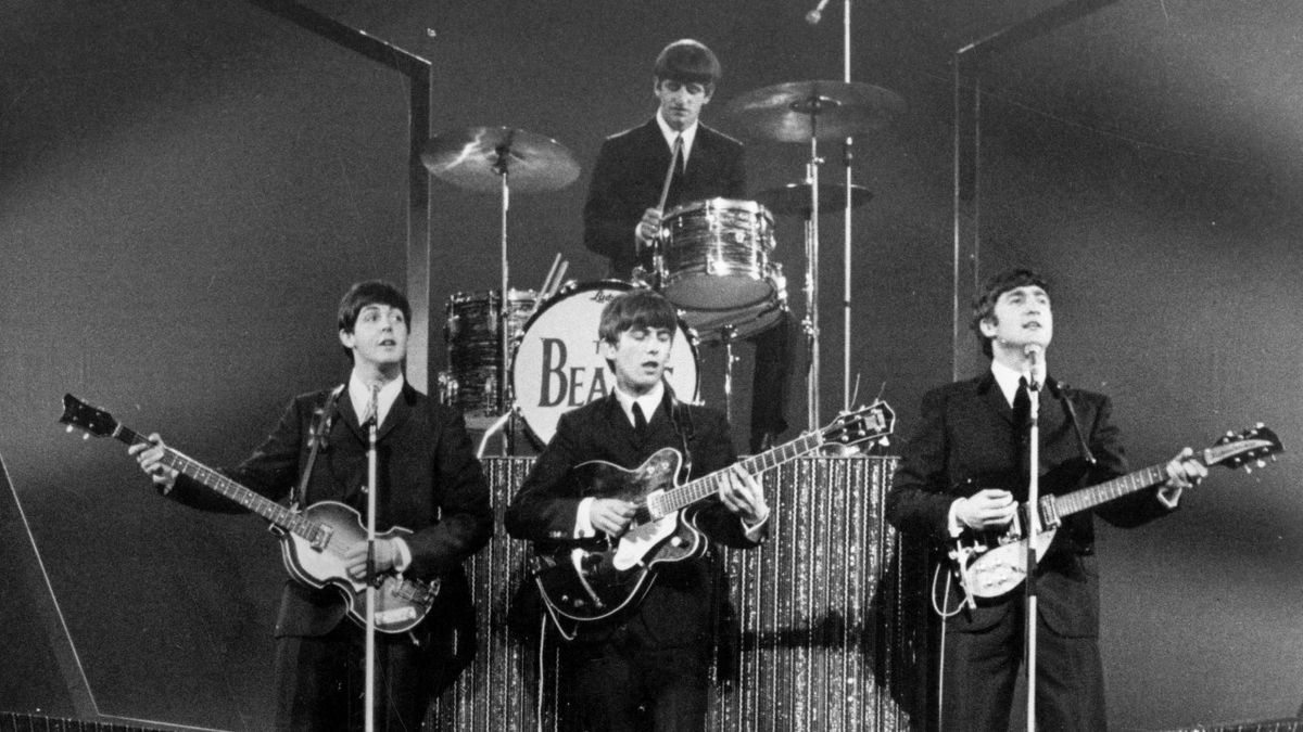 The Beatles on stage at the London Palladium during a performance in front of 2, 000 screaming fans