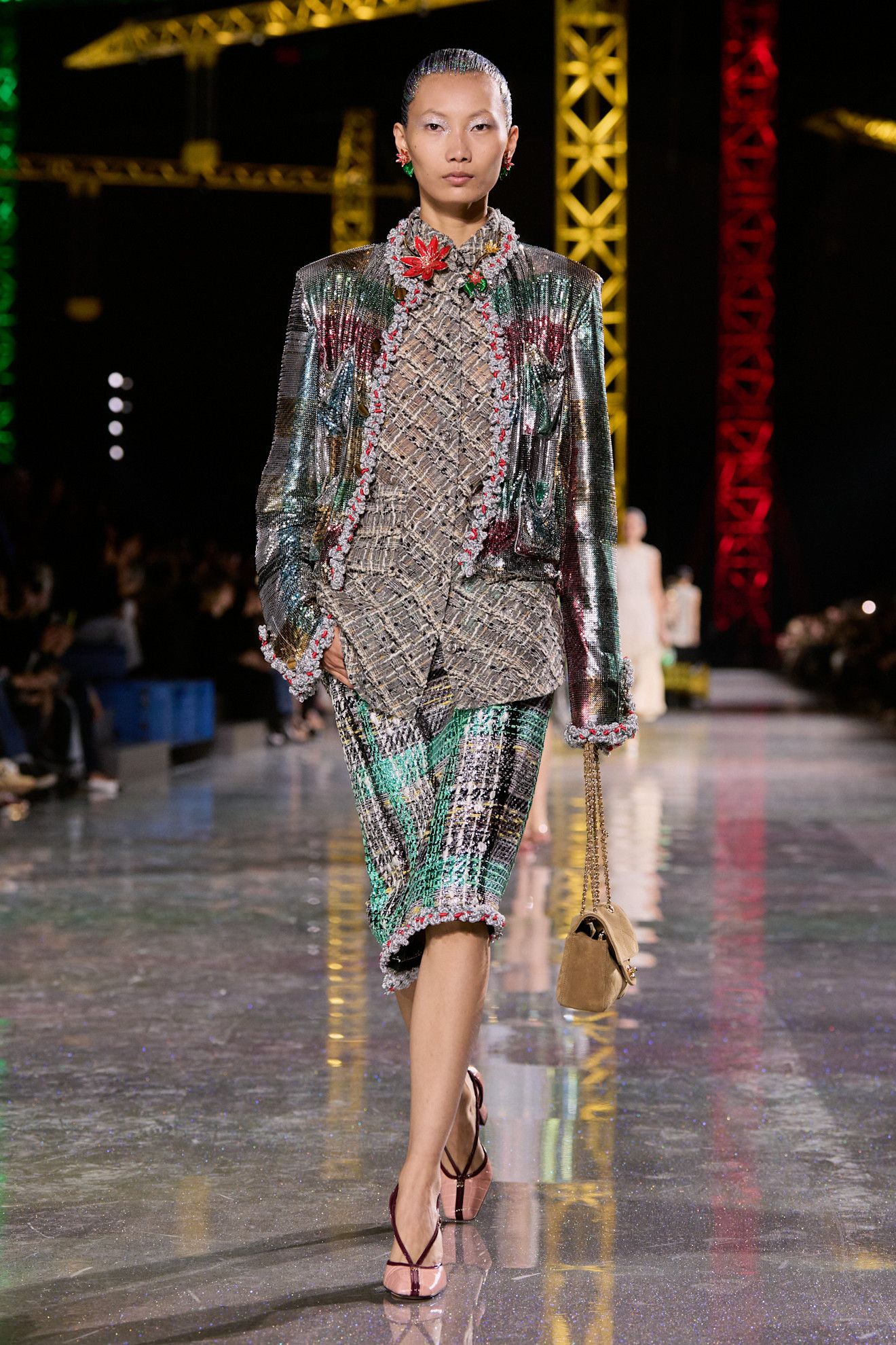 A model wore Hailey Bieber's metallic jacket for Chanel Fall 2026