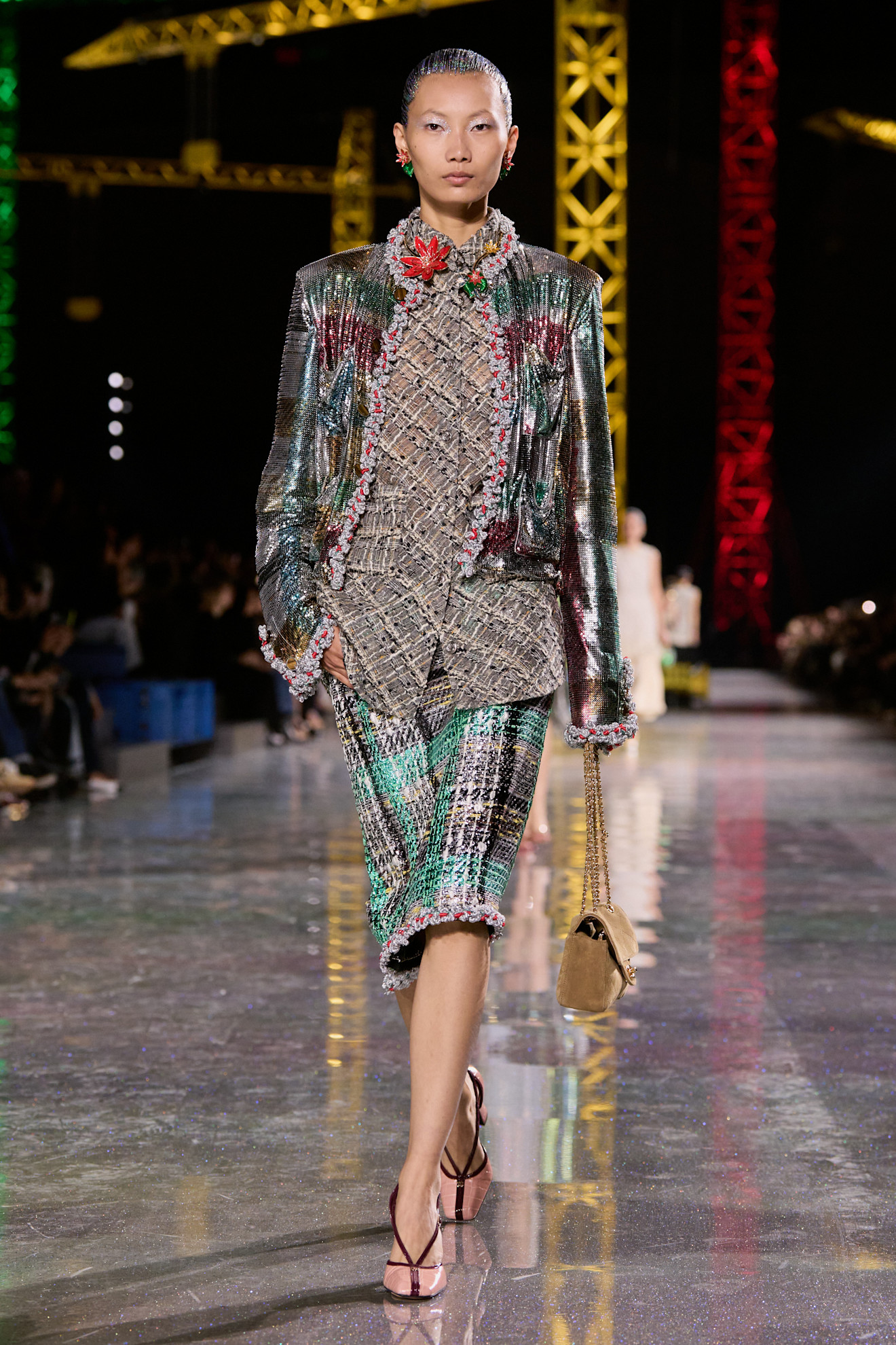 A model wore Hailey Bieber's metallic jacket for Chanel Fall 2026