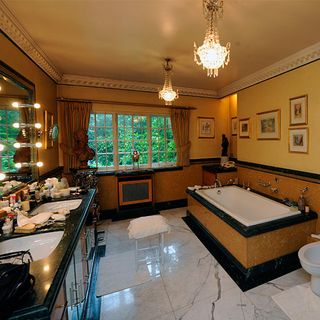 mansion bathroom with marble flooring