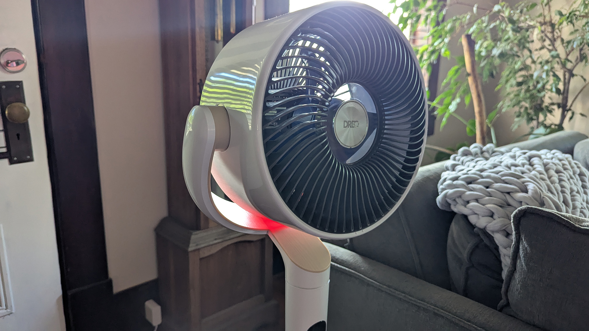 Close up of fan head on Dreo TurboPoly Fan 508S, showing red ambient lighting