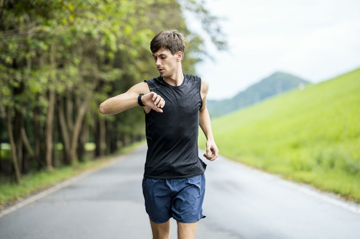 Runner looking at watch