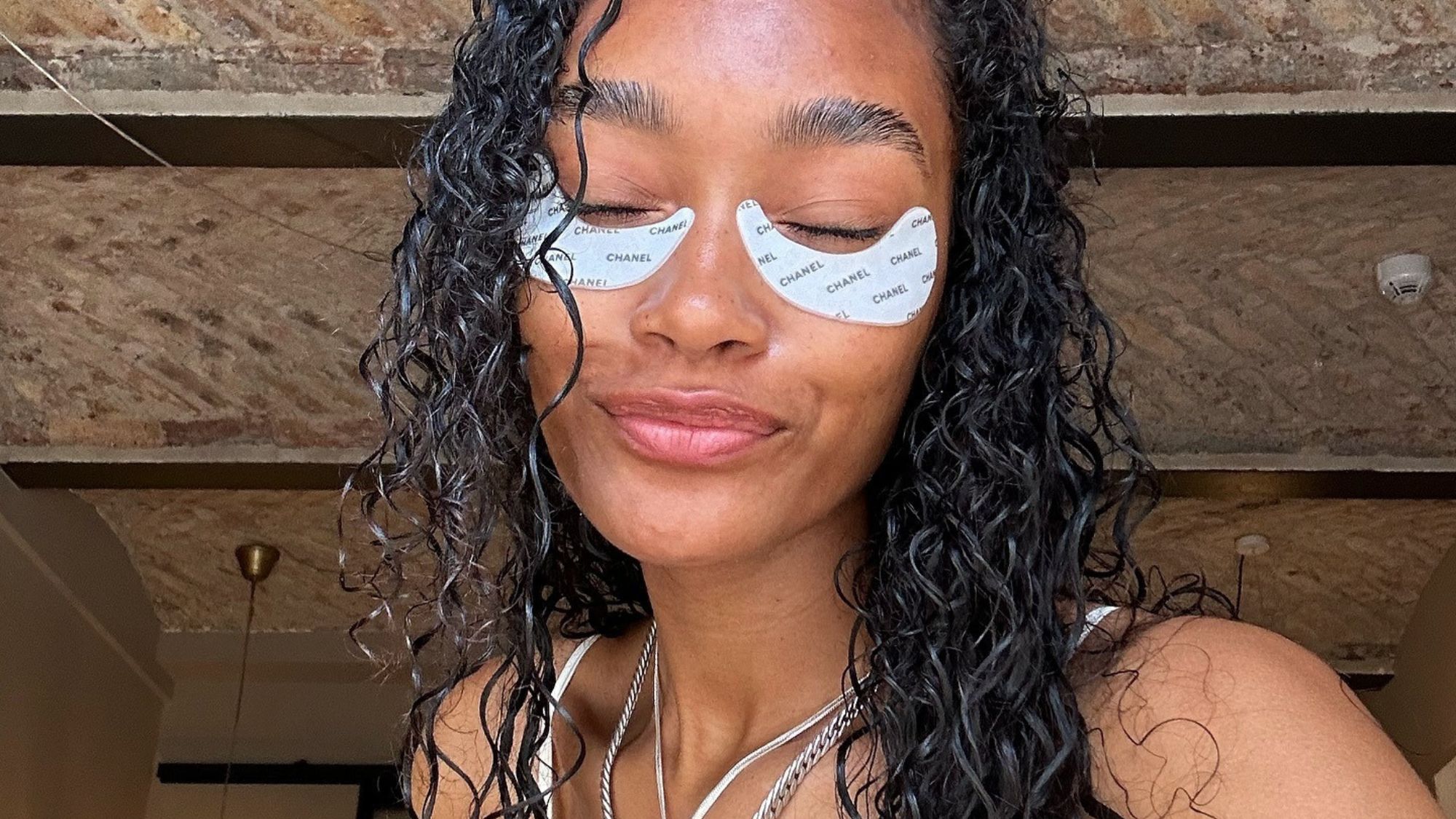 Cheyenne Maya Carty with wet, post-shower hair and eye patches on.
