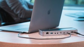 MacBook open on desk connected to best dock for MacBook Pro