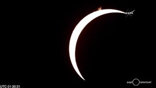 The total solar eclipse of 2016 nears totality in this telescope view captured on March 9, 2016 from Woleai Island in Micronesia during a NASA webcast.