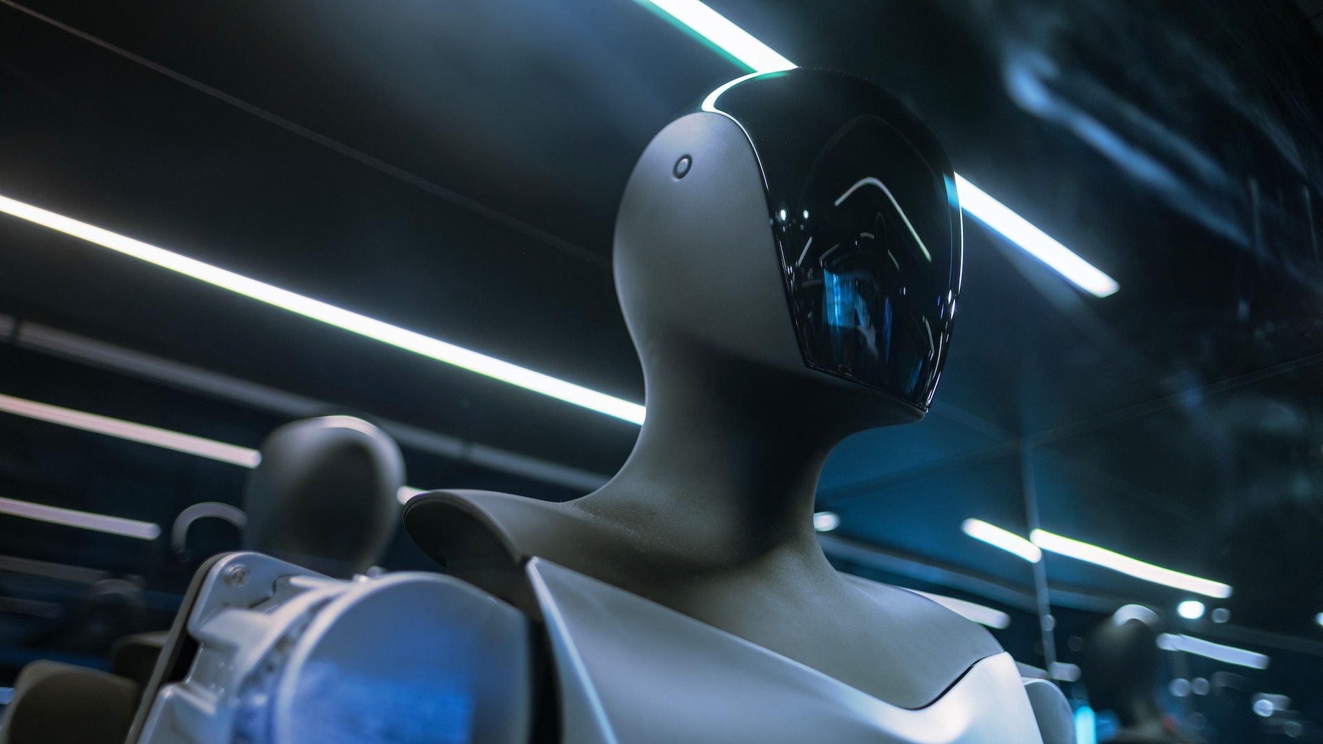 Tesla primed to sell AI-powered humanoid robots alongside its EVs in 2025. But will they be any good?