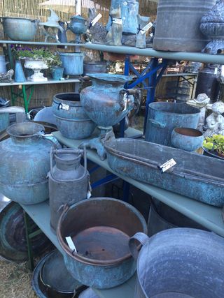 Stall full of salvaged garden planters