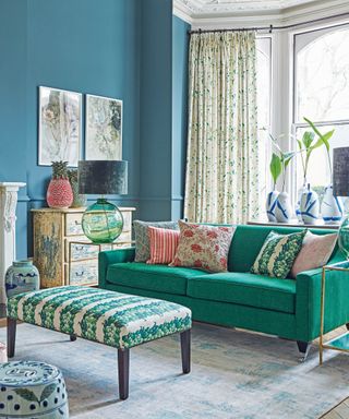 Blue painted living room with colorful accessorises