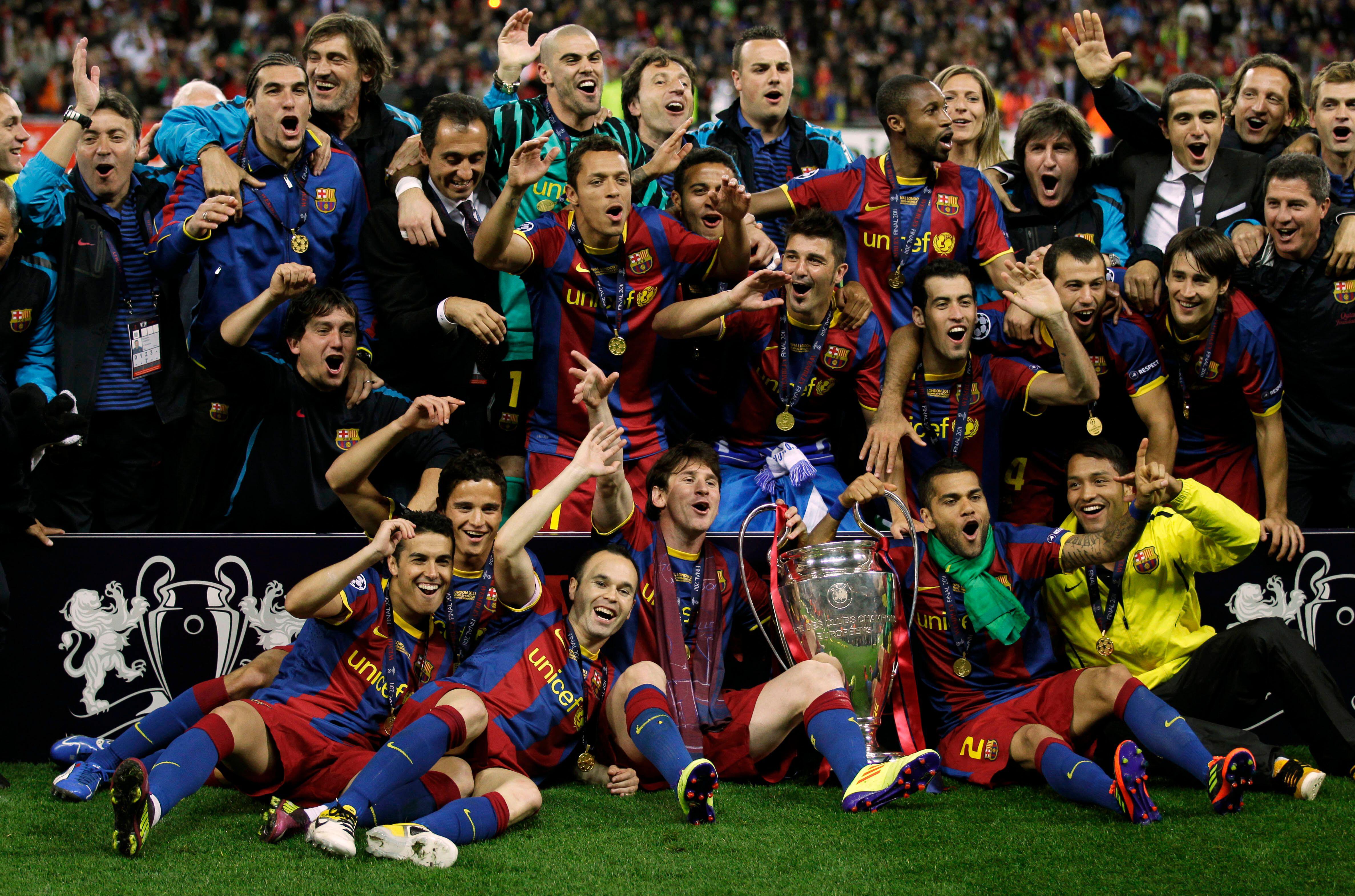 Barcelona celebrate with the Champions League trophy, 2011