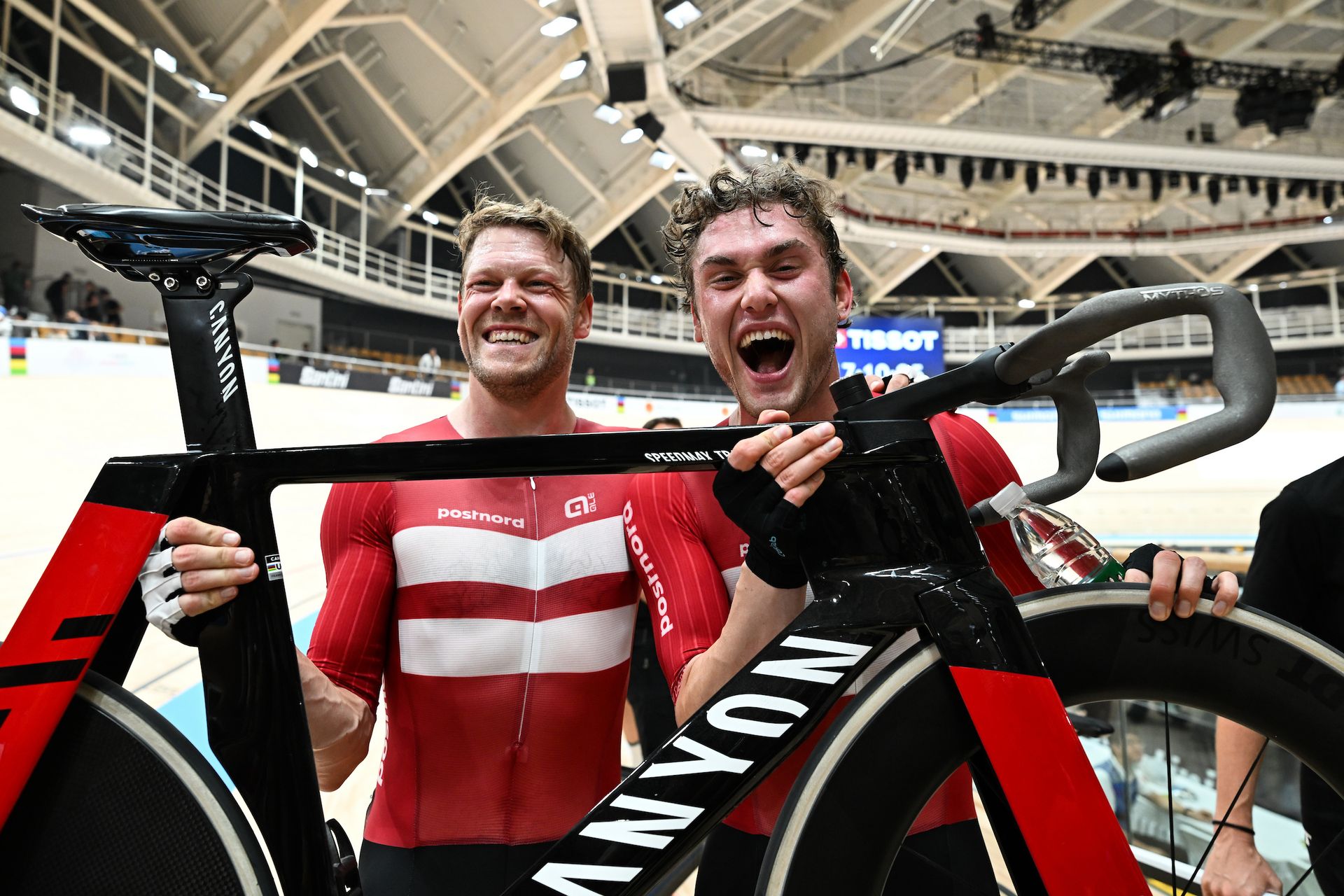 Picture by Simon Wilkinson/SWpix.com - 18/10/2026 - Cycling - 2026 Tissot UCI Track World Championships - Chongming Shanghai Velodrome, Shanghai, China - Men's Madison - Carl-Frederik Bevort (Denmark) and Lasse Leth (Denmark) celebrates winning to become World Champion