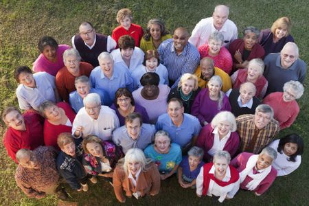 Crowd of older people standing together