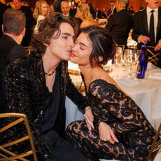 Kylie Jenner in a sheer lace gown with Timothee Chalamet
