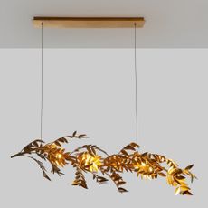 ceiling light with delicate leaves and gold leaves bar