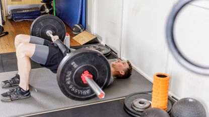 Image shows a person working out at the gym for cycling benefits