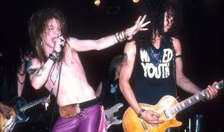 Axl Rose (left) and Slash perform in 1987