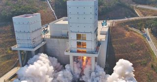 The first stage of the new Korea Space Launch Vehicle Nuri undergoes a test fire in this image released by the Korea Aerospace Research Institute in March 2021.