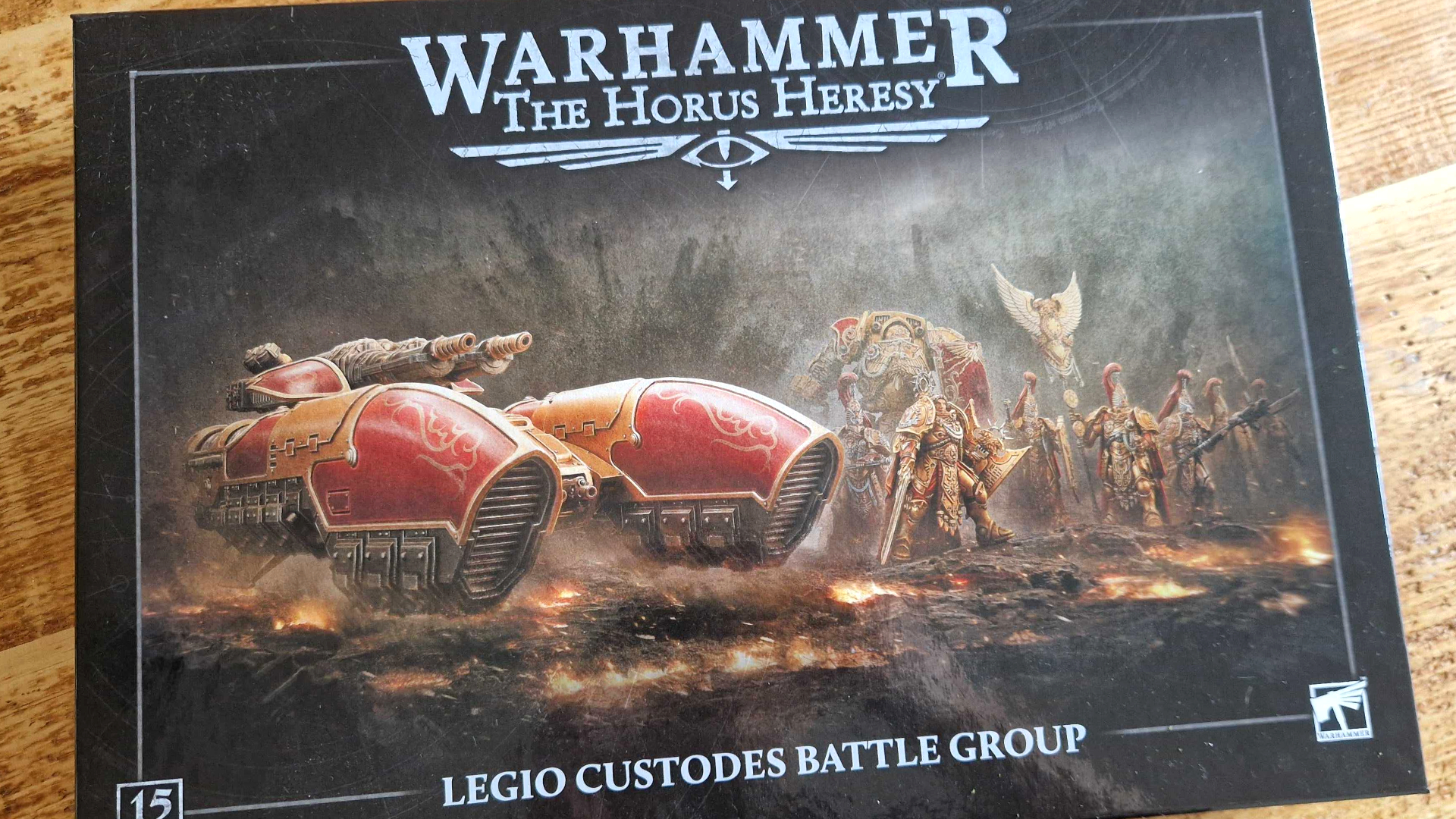 Custodes Battle Group box on a wooden surface