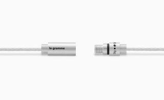 two ends of silver cable bracelet by Le Gramme, ready to connect