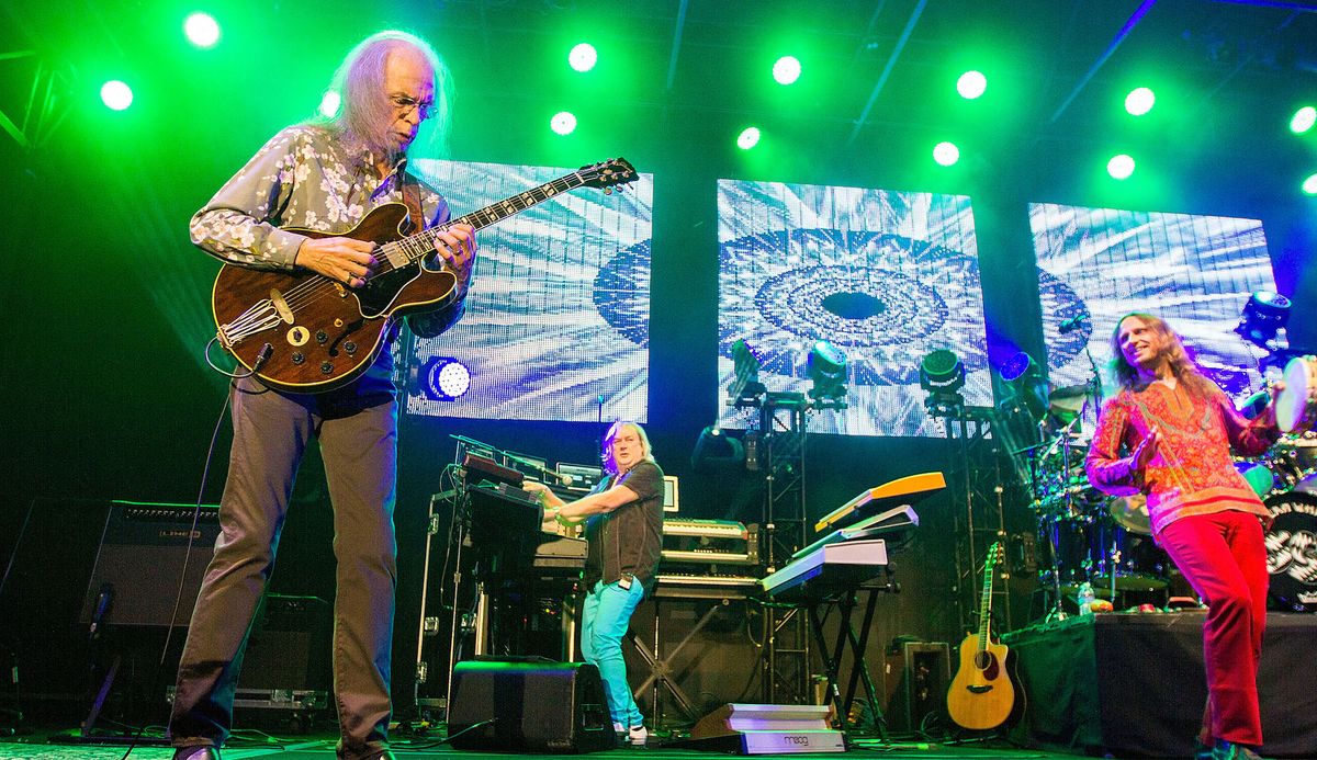 (left to right) Steve Howe, Geoff Downes and Jon Davison perform on stage with Yes on August 18, 2014 in San Diego, California