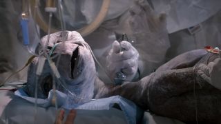 E.T. lies dying on a hospital table in E.T. The Extra-Terrestrial.