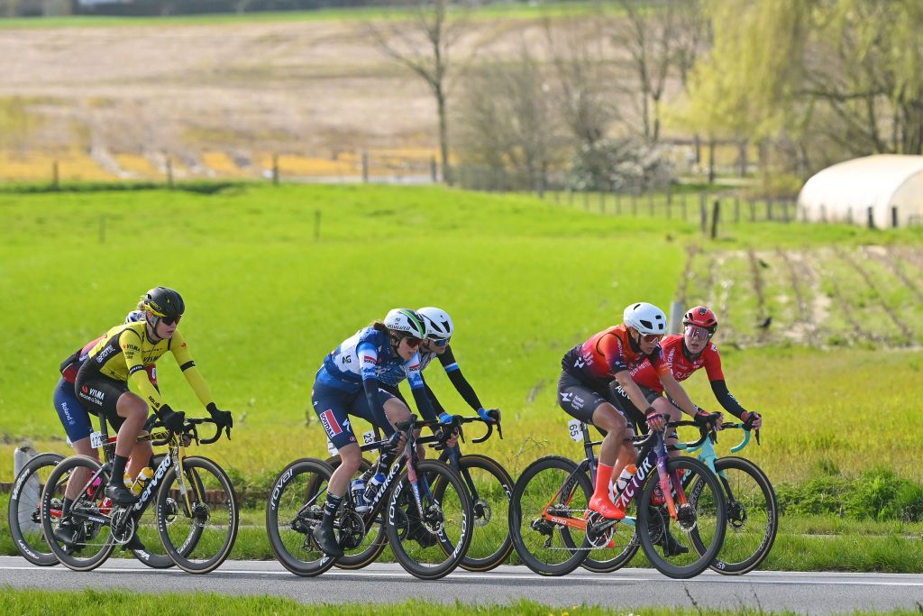 WEVELGEM BELGIUM MARCH 24 LR Lieke Nooijen of The Netherlands and Team Visma Lease A Bike Laura Molenaar of The Netherlands and Volkerwessels Pro Cycling Team Julie Van De Velde of Belgium and AG InsuranceSoudal Team Katia Ragusa of Italy and Team Human Powered Health Amandine Fouquenet of Norway and Team ArkeaBB Hotels compete in the breakaway during the 13rd GentWevelgem in Flanders Fields 2024 Womens Elite a 1712km one day race from Ieper to Wevelgem UCIWWT on March 24 2024 in Wevelgem Belgium Photo by Luc ClaessenGetty Images