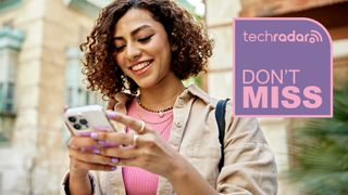 Happy woman using phone