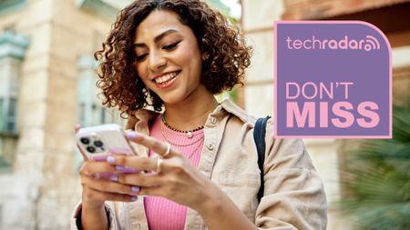 Happy woman using phone