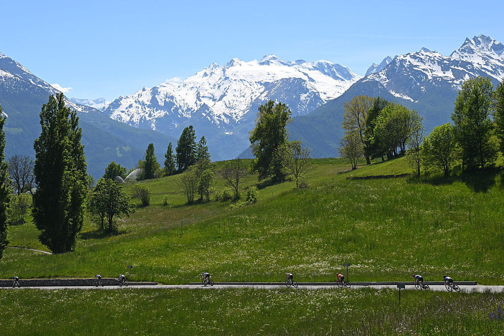 PILA - GRESSAN, ITALY - MAY 23: A general view of the peloton competing during the 109th Giro d&amp;amp;apos;Italia 2026, Stage 14 a 133km stage from Aosta to Pila - Gressan 1789m / #UCIWT / on May 23, 2026 in Pila - Gressan, Italy. (Photo by Tim de Waele/Getty Images)
