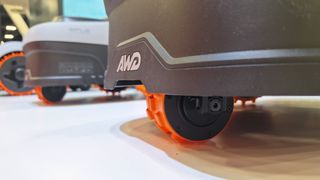 Navimow i2 AWD robot mower in action on astroturf