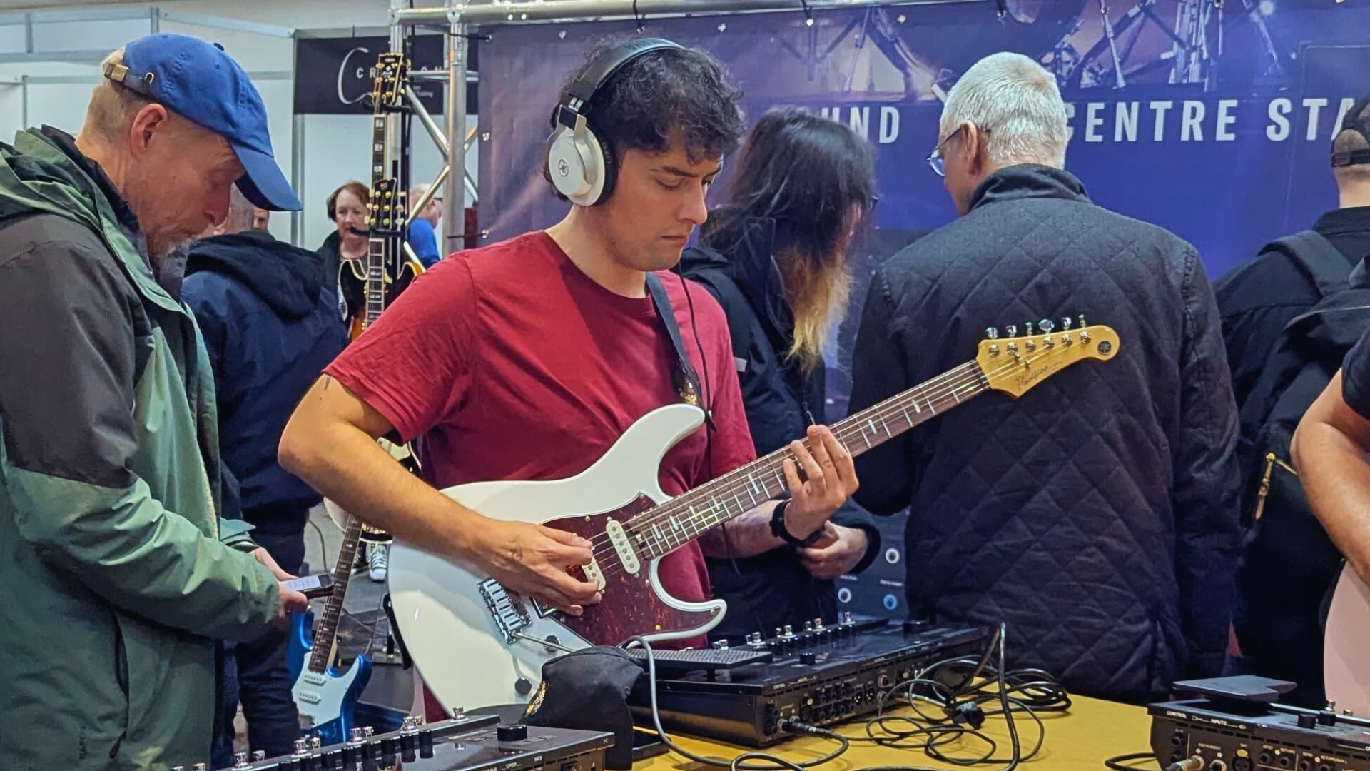 Guitar World author Matt McCracken plays a Line 6 Helix Stadium XL with a Yamaha Pacifica electric guitar at The Guitar Show in Birmingham, UK