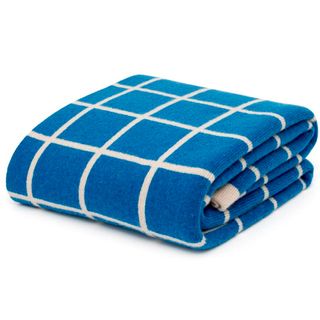 grid knitted blanket with blue colour and white background