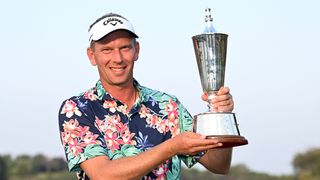 Marcel Siem with the Hero Indian Open trophy following his victory in 2023