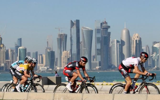 The peloton and the Doha skyline