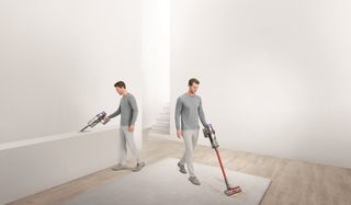 Double exposure of a man using a Dyson vacuum with various attachments to clean a rug on the floor and a elevated surface.
