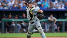 Henry Davis #32 of the Pittsburgh Pirates throws the ball to first base during the game between the Pittsburgh Pirates and the Kansas City Royals at Kauffman Stadium on Monday, July 7, 2025 in Kansas City, Missouri