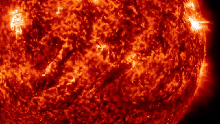gif animation showing a large filament erupting from the sun.