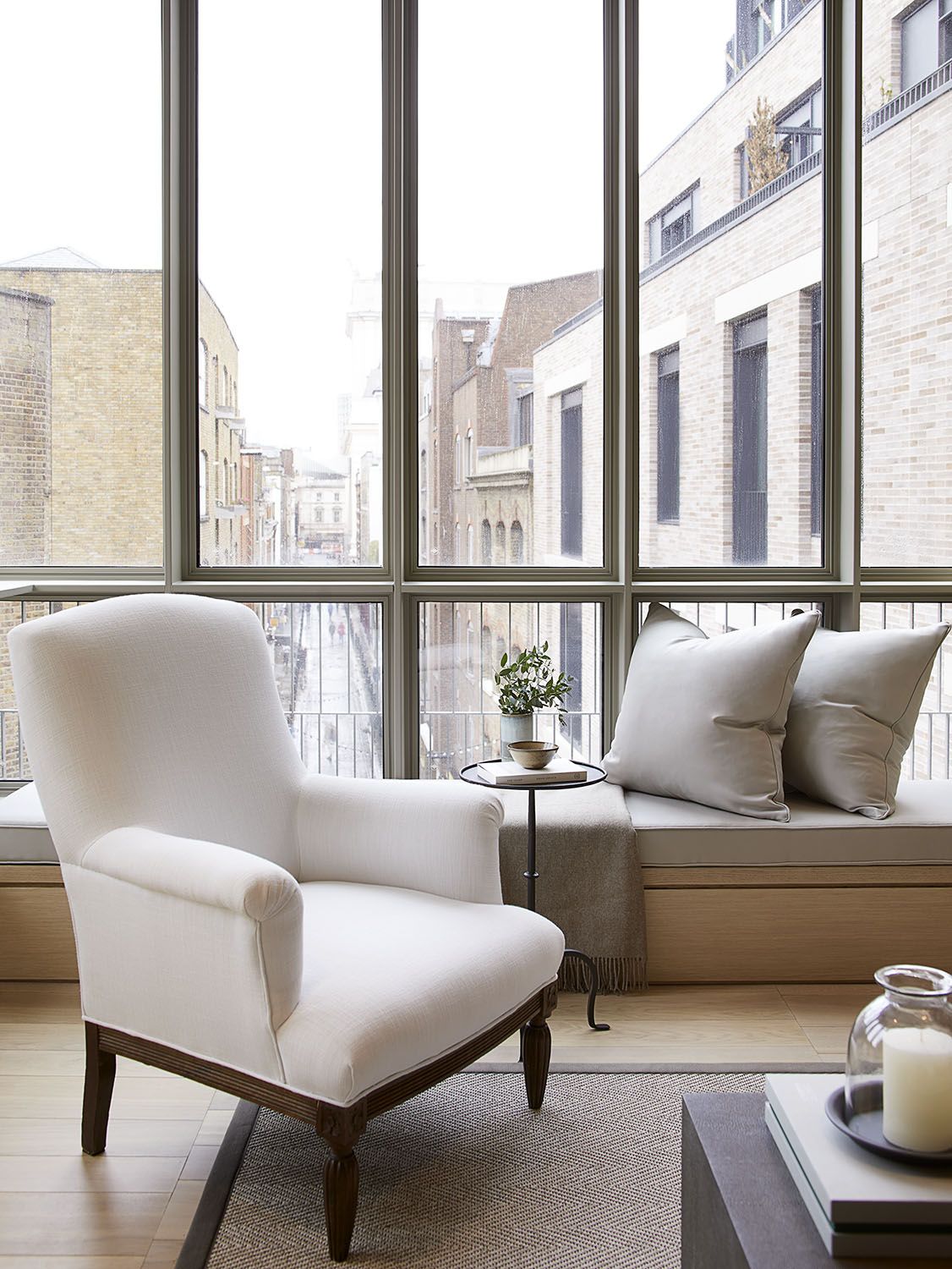 grey furnishings on a window seat
