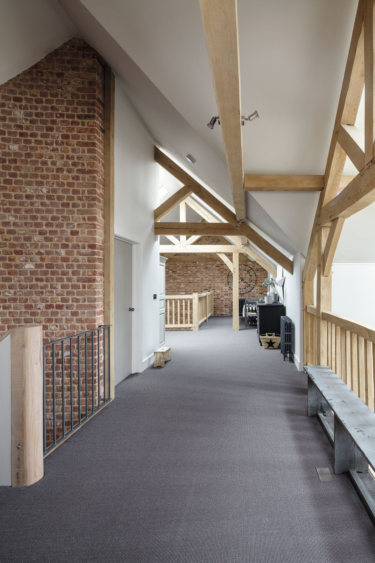vaulted ceiling landing with oak balustrades