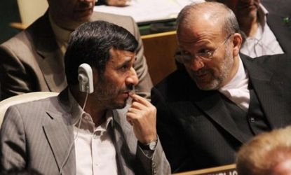 Iranian President Mahmoud Ahmadinejad (L) and Iranian Foreign Minister Manouchehr Mottaki attend the United Nations 2010 Conference on the Non-Proliferation of Nuclear Weapons at U.N.