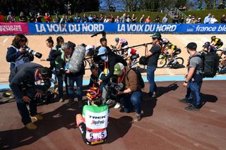 Elisa Longo Borghini surrounded by photographers at the 2022 Paris-Roubaix