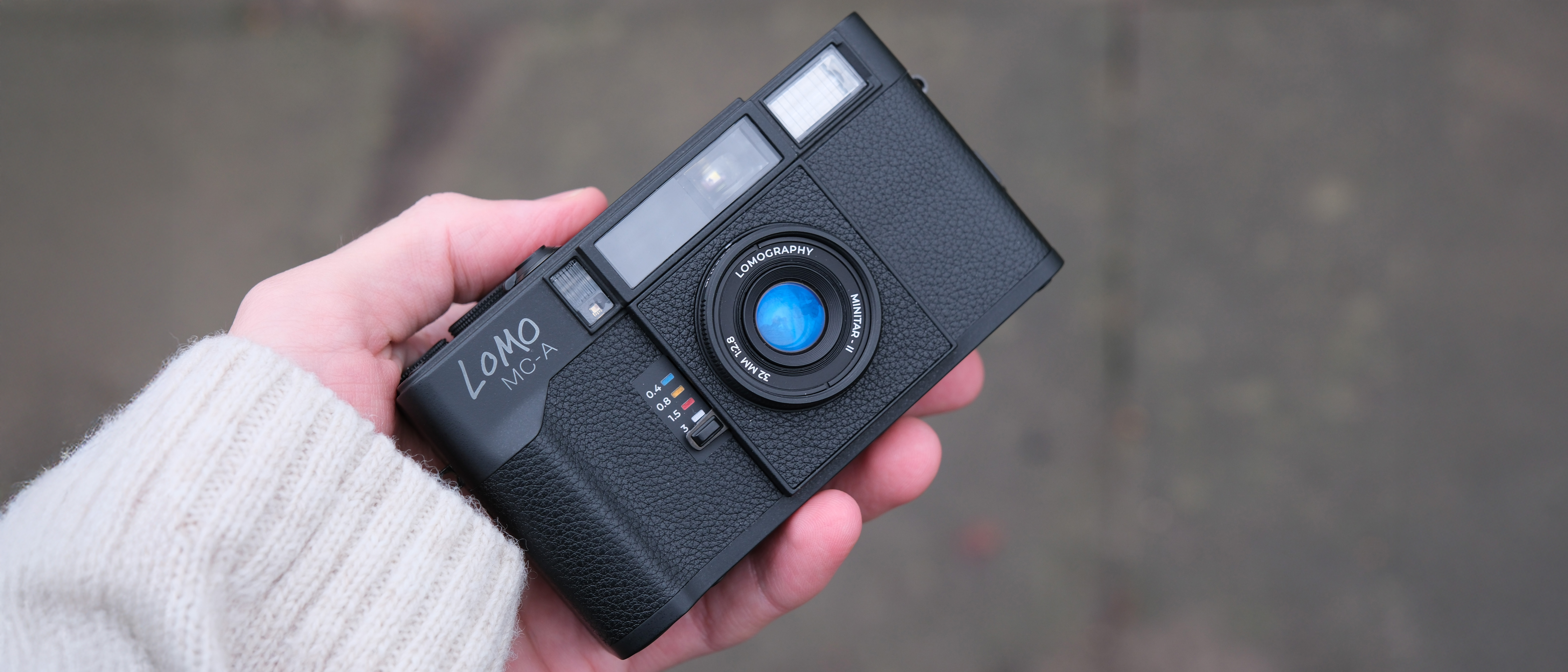 Lomography Lomo MC-A camera held in a hand