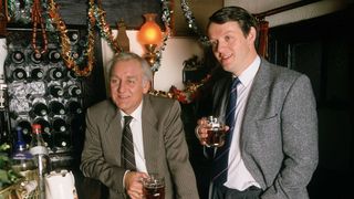 Inspector Morse actors John Thaw and Kevin Whately drinking in a pub