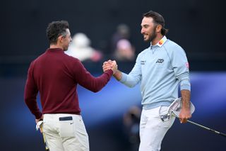 Rory McIlroy and Max Homa shake hands on the 18th green at Royal Troon