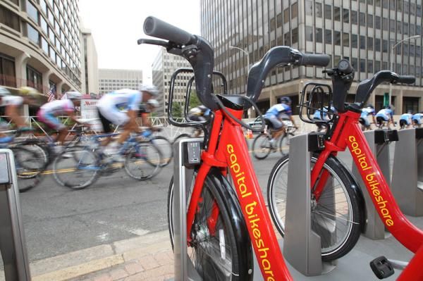 Riders pass by a couple of the nifty Capitol Bikeshare bikes along the course.