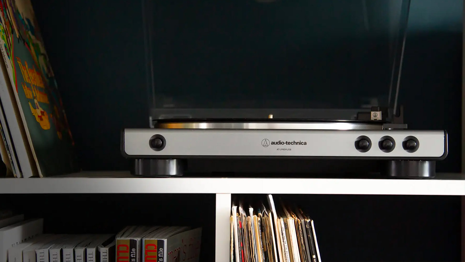 An Audio-Technica turntable on a bookshelf