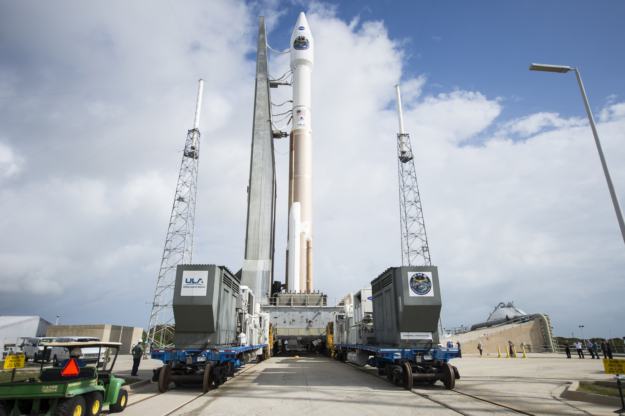 A United Launch Alliance Atlas V rocket carrying NASA&#039;s four Magnetospheric Multiscale mission satellites rolls out to the launch pad at Cape Canaveral Air Force Station in Florida one day before its planned March 12, 2015 launch. The mission will study m