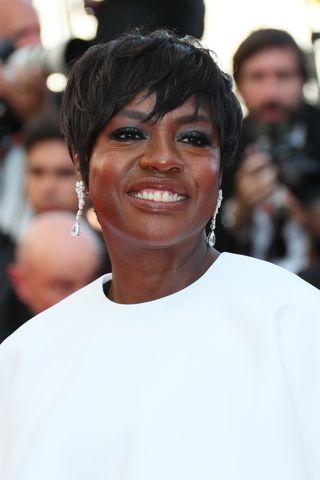 Viola Davis is pictured with a stylish pixie cut on the Red Carpet of the closing ceremony at the 77th annual Cannes Film Festival at Palais des Festivals on May 24, 2024 in Cannes, France.